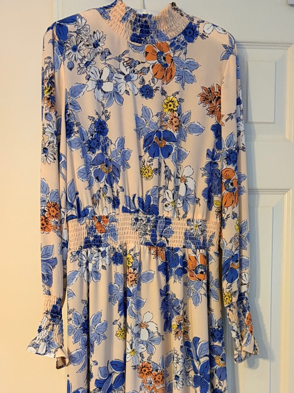 Nanette Lepore long-sleeve floral high-low dress.